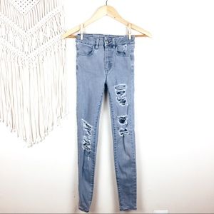 American Eagle •  Grey Distressed Skinny Jeans